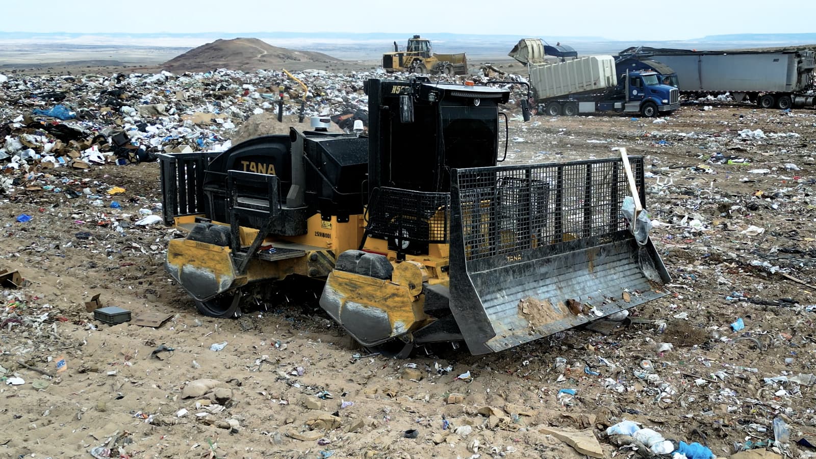 4RE | A TANA compactor crushing trash at the Cerro Colorado Landfill.