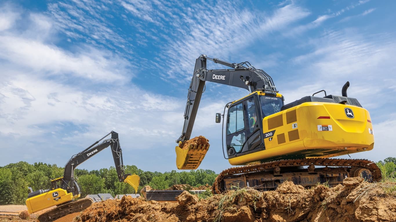A 200G Excavator moving dirt at a worksite with a 180P-Tier Excavator also moving dirt in the background. | 4re Equipment | ID: 200GEXFT4