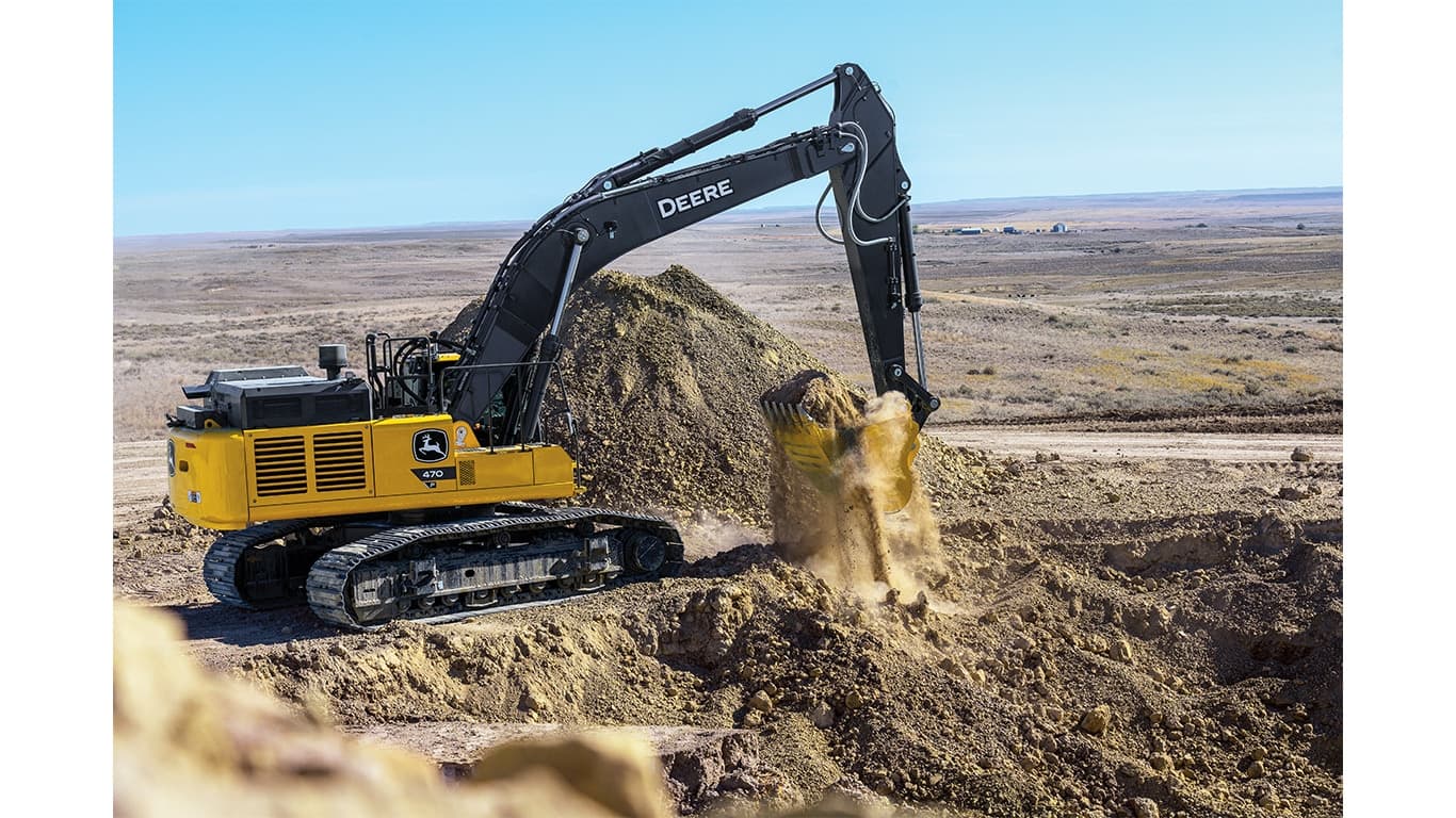 A 470-P-Tier Excavator scooping up dirt on top of a hill at a worksite. | 4re Equipment | ID: 470PEXFT4
